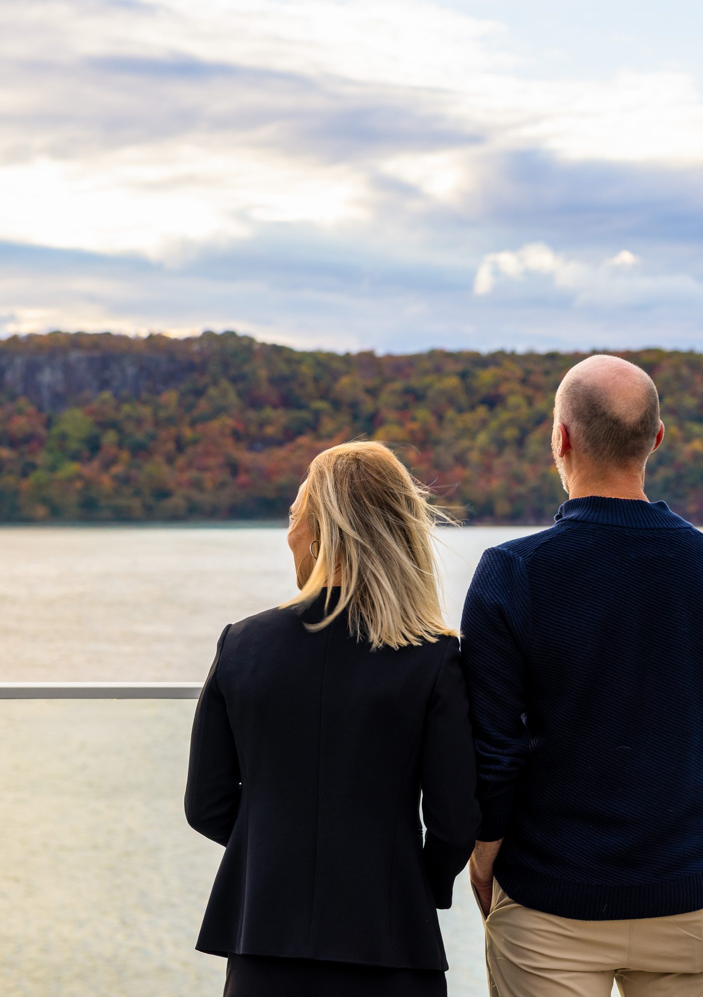 Residents looking out over the Hudson and the Palisades