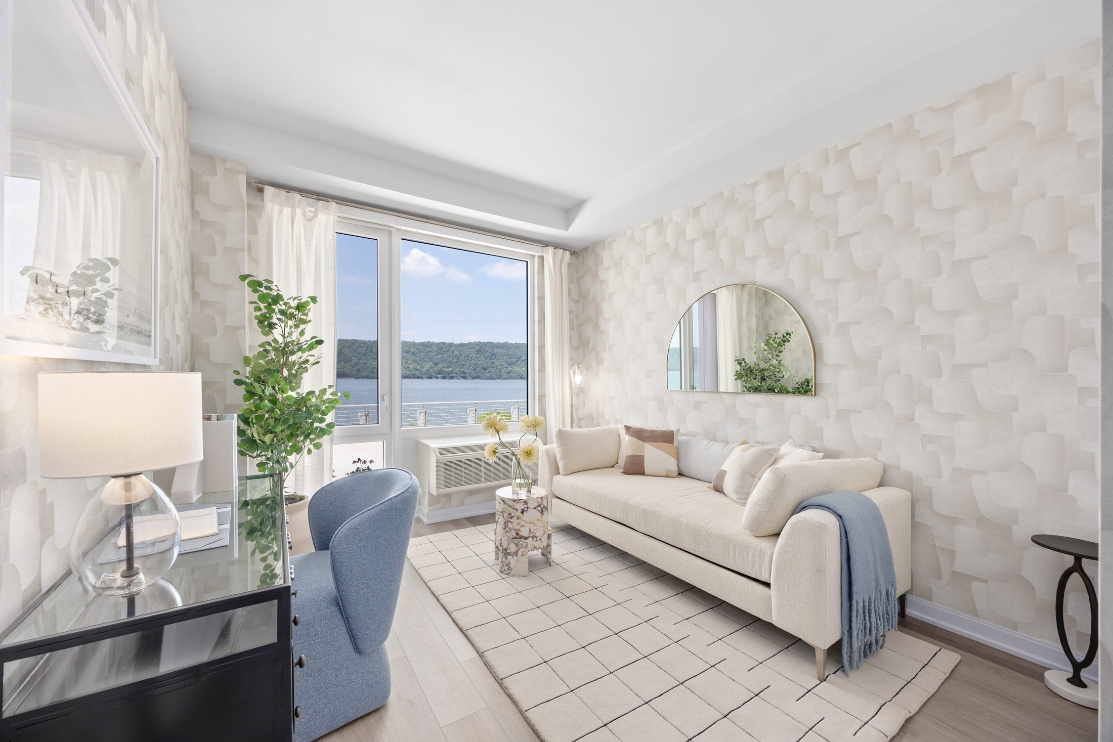 Living room with river views and textured wallcovering